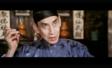 Profile of Kwan Tak-hing