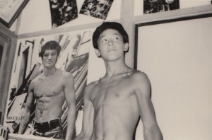 A 12 year old Kenya strikes a pose in front of his boyhood idol, Bruce Lee!
