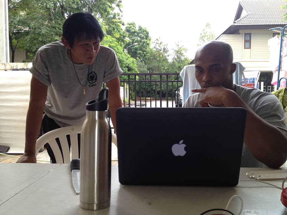 Panna and Marrese reviewing footage