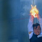 Jackie performs his own dangerous fire stunt