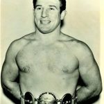 Gene during his pro wrestling days