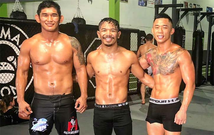 Aung La with teammates Tial Thang and Martin Nguyen