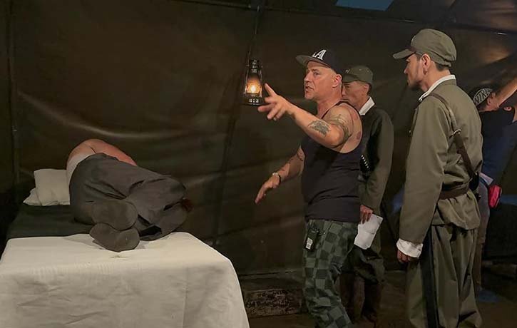 Louis coordinates the next scene of Prisoner of War Louis coordinates the next scene of Prisoner of War