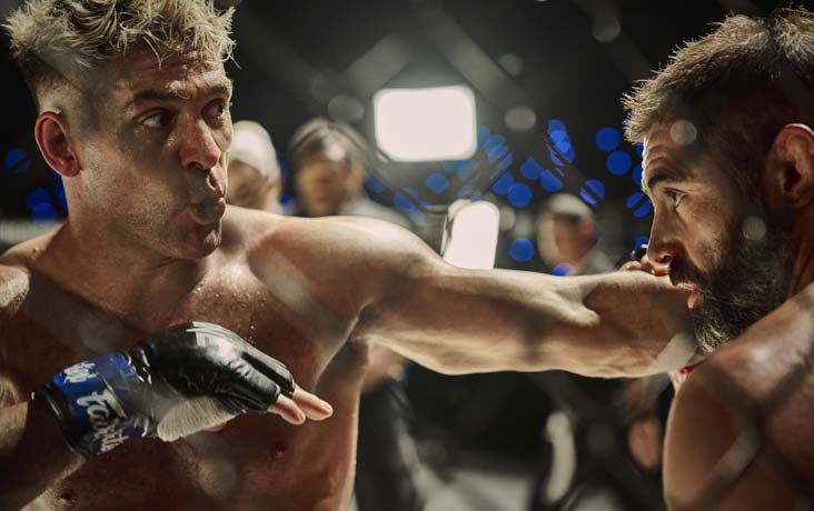 Patton and Xavier engage in close combat.