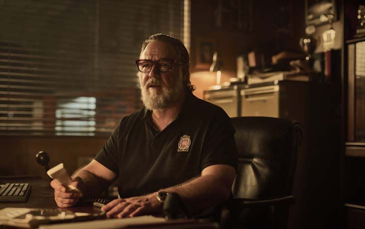 Sammy watches Patton's fight with Xavier to cheer on his fighter.