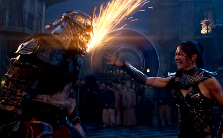 Princess Kitana wields a deadly attack against Shao Khan!