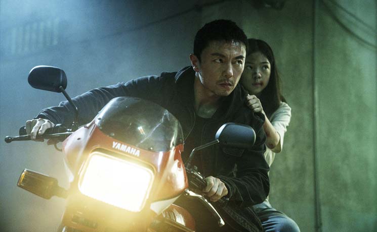 Wang Wei prepares his escape with his daughter Rainy.
